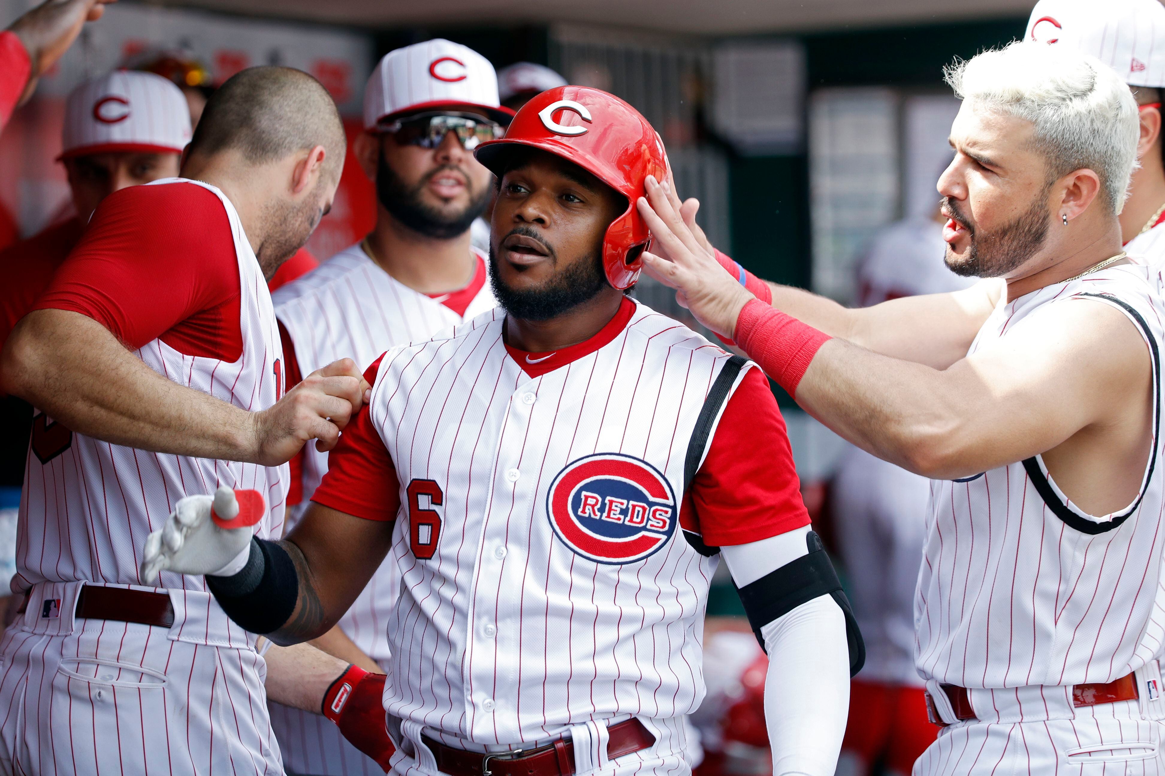 Reds wear sleeveless 1956 throwback jerseys