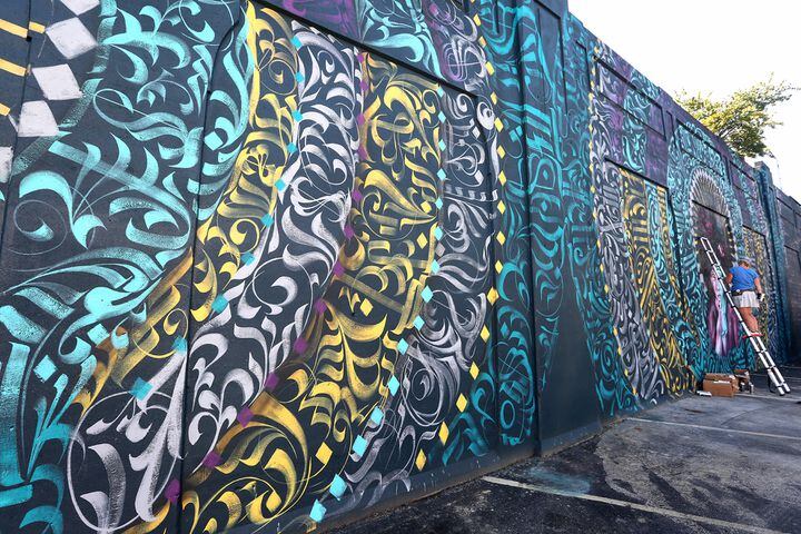 PHOTOS: New Dayton mural created in calligraffiti style with more than 20 colors