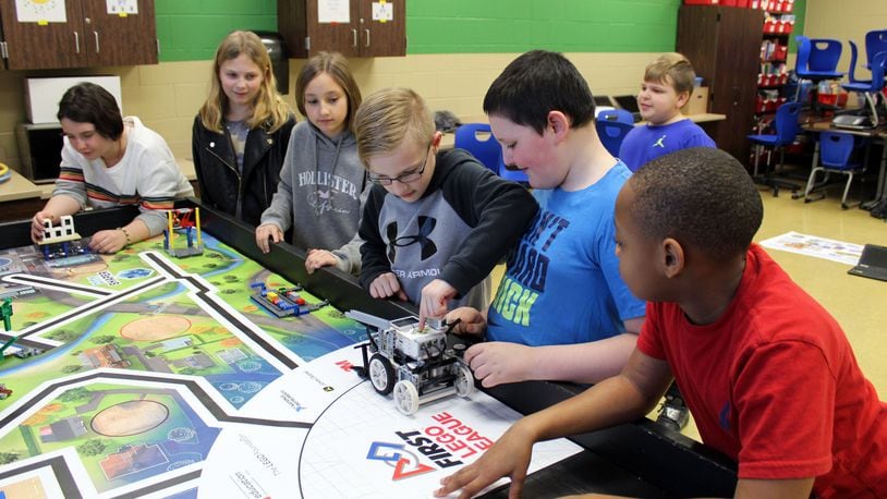The fourth- and fifth-grade robotics team from Xenia’s McKinley Elementary, named “X Marks the Bot,” qualified for the 2020 FIRST Lego League state tournament. FILE