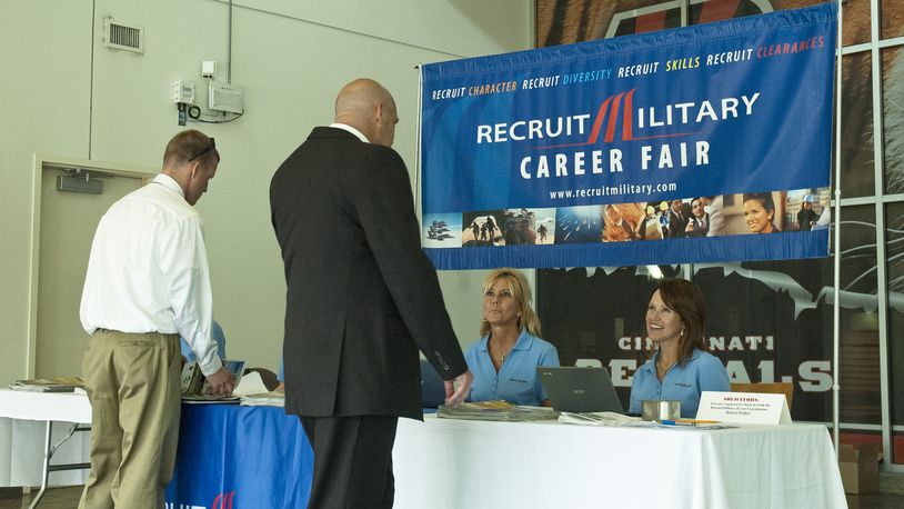 Attendees check-in at a RecruitMilitary job fair held in Cincinnati in 2013. RecruitMilitary is returning with a job fair May 25, 2017, at Paul Brown Stadium. CONTRIBUTED