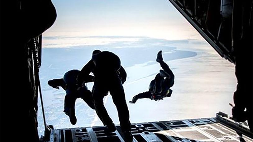 Navy Leap Frogs jump from a Blue Angels C-130 Hercules aircraft. (Contributed photo)