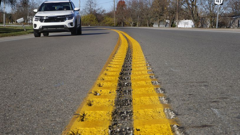 Rumble strips have been added to the center of Ohio Route 41 near where a fatal bus crash occurred earlier this year. BILL LACKEY/STAFF