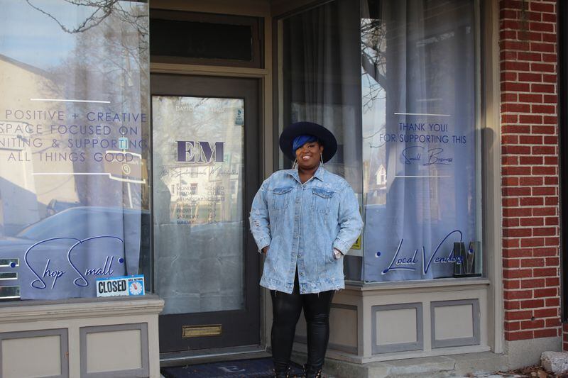 Tae Winston outside of the The Entrepreneurs Marketplace in the Historic Wright Dunbar Business District. She plans to open a new downtown business sometime next year. CORNELIUS FROLIK / STAFF
