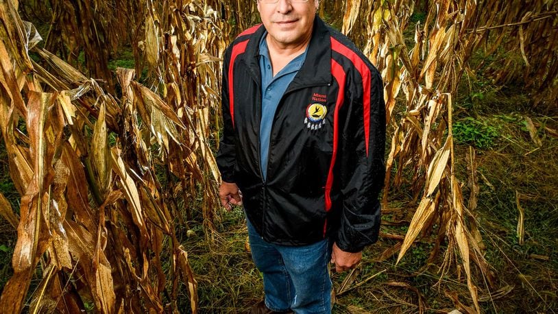 Daryl Baldwin, a citizen of the Miami Tribe of Oklahoma and Director of the Myaamia Center at Miami University, stands last fall in a patch of tribal corn raised from preserved seeds on university’s ecology center farm off campus. Baldwin, who has spent decades studying, preserving and sharing the language and culture of the Native American Miami Tribe, was the first Southwest Ohio winner of the national MacArthur Foundation genius grant. NICK GRAHAM/STAFF FILE 2016