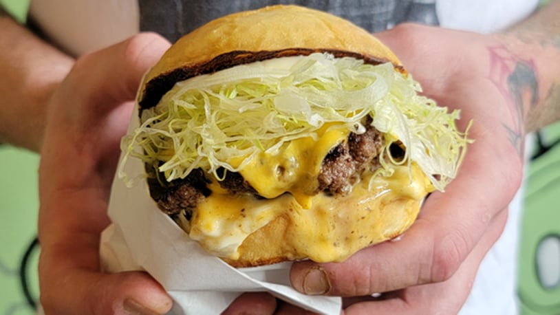 Koji Burger, tested and developed during the Miami Valley Restaurant Association’s restaurant week, is returning to the Jollity via pop-up this month.