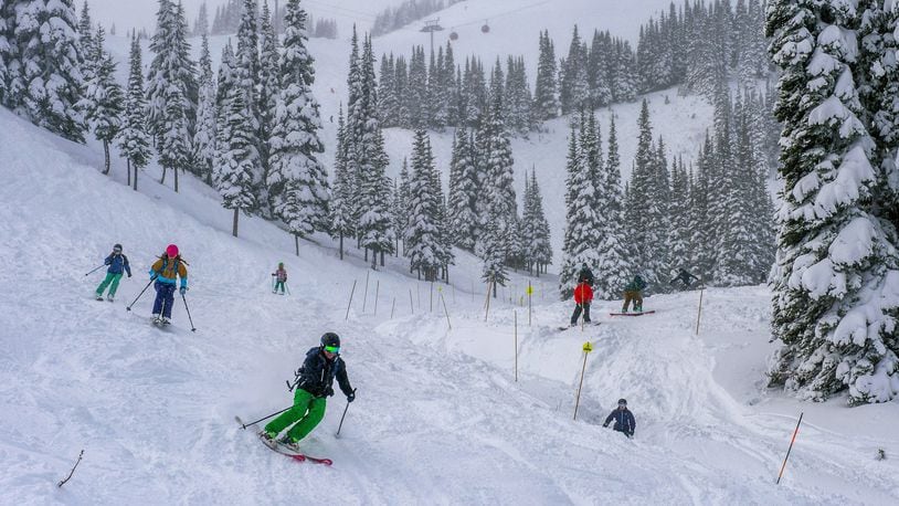 FILE: A crowd of skiers were happy with fresh, soft snow to start out  the 2016-17 season at Crystal Mountain, November 25, 2016. (Peter Haley/The News Tribune/TNS)