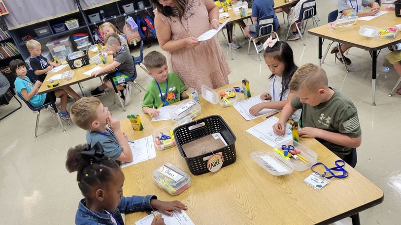 A teacher works with students at Clearcreek Elementary in Springboro City School District during the district's first day in August 2022. Photo courtesy of Springboro Schools.