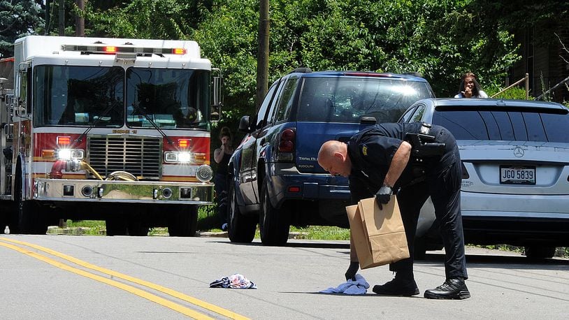 Dayton Police and medics were called to the 900 block of Wyoming Street Wednesday June 15, 2022 on reports of a person shot in the neck.
MARSHALL GORBY\STAFF