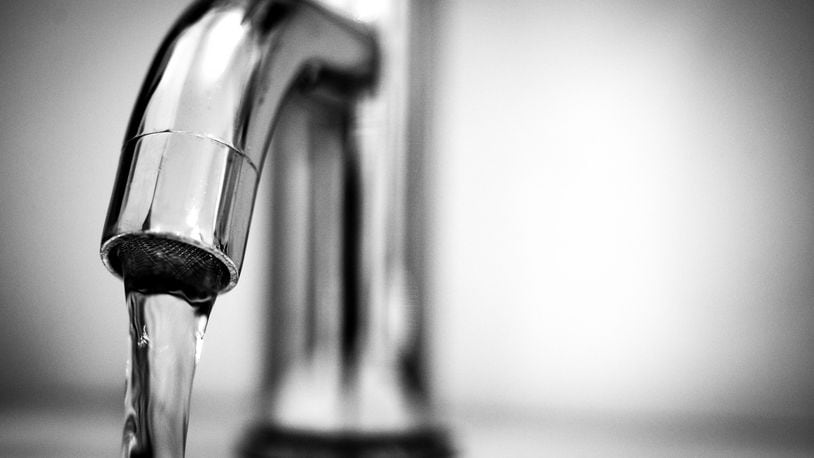 Photo illustration of a water faucet.