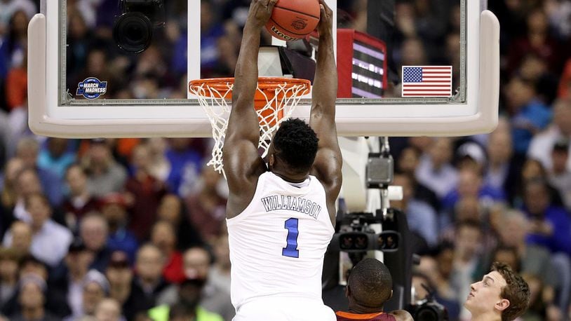 WASHINGTON, DC - MARCH 29: Zion Williamson #1 of the Duke Blue Devils dunks the ball against the Virginia Tech Hokies during the first half in the East Regional game of the 2019 NCAA Men's Basketball Tournament at Capital One Arena on March 29, 2019 in Washington, DC. (Photo by Patrick Smith/Getty Images)
