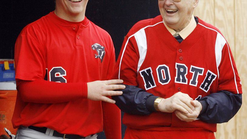 North baseball player Justin Williams and Don Henderson, one of two coaches in North baseball history, share a laugh during a game against Northwestern in the Panther Classic Saturday, April 12, 2008. Staff Photo by Barbara J. Perenic