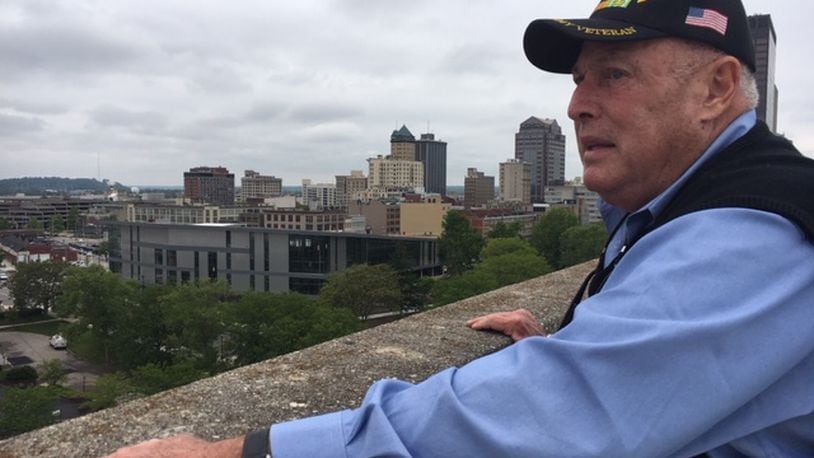 Sandy Mendelson, atop his eight-story First Street building looking over downtown Dayton, in a 2017 photo. THOMAS GNAU/STAFF