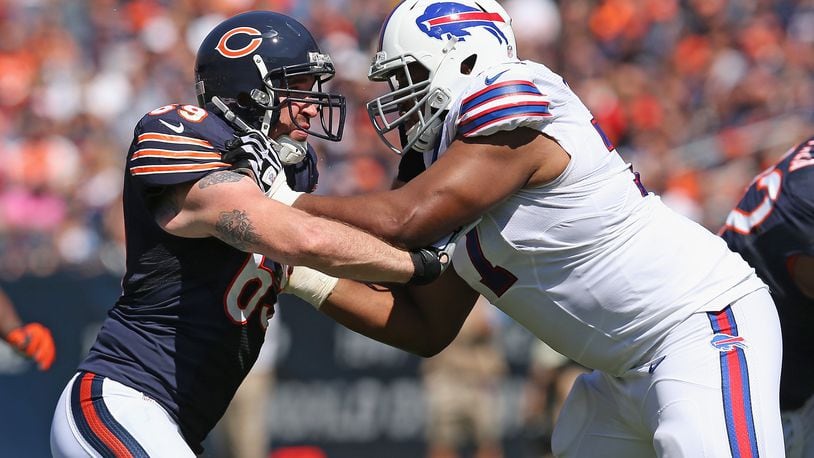 CHICAGO, IL - SEPTEMBER 07:  Jared Allen #69 of the Chicago Bears rushes against Cordy Glenn #77 of the Buffalo Bills at Soldier Field on September 7, 2014 in Chicago, Illinois. The Bills defeated the Bears 23-20 in overtime.  (Photo by Jonathan Daniel/Getty Images)