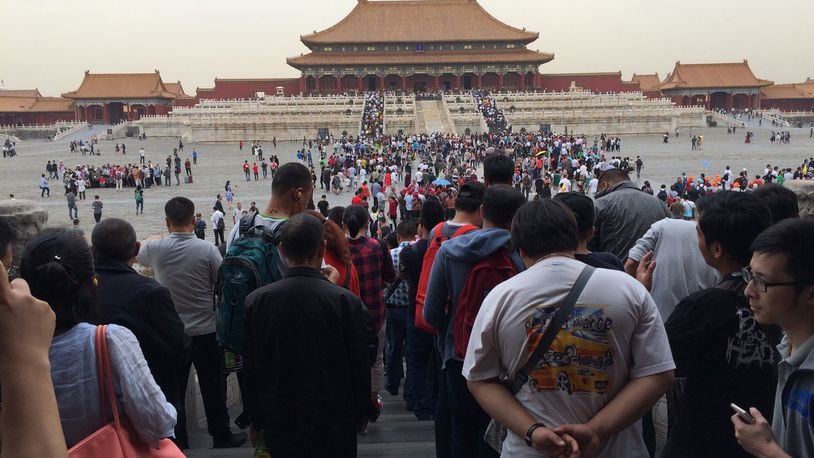 A crowd of tourists visits the Forbidden City in Beijing, China, in September 2017. (Thomas Huang/Dallas Morning News/TNS)