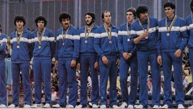 Former University of Dayton basketball standout Mike Sylvester (seventh from left) won a silver medal with Italy in the 1980 Olympics in Moscow. Sylvester was the lone American medalist. The United States boycotted those Games. CONTRIBUTED PHOTO