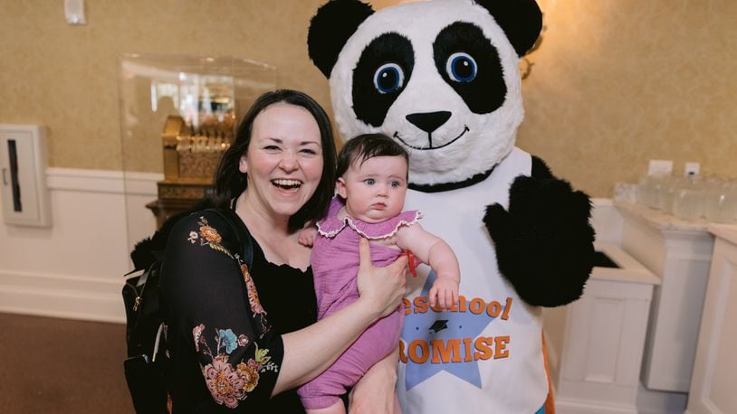 Attendees pose with the Preschool Promise panda during the second annual awards banquet from Preschool Promise. CONTRIBUTED