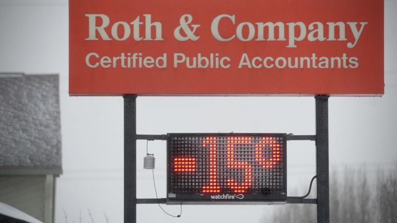 According to this business sign, it was -15° in Englewood on Friday, Dec. 23, 2022. Officially, the National Weather Service recorded a record low temperature for the date at the Dayton International Airport with -9°. MARSHALL GORBY \STAFF
