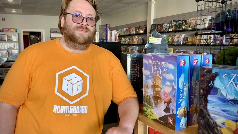 Justin Schotz and his wife Jordan recently opened Room and Board Gaming on Maple Avenue in Fairborn. LONDON BISHOP/STAFF