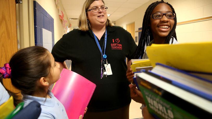 Some teachers like Melodie Larsen make Dayton Public Schools a career because, as she says, “this is where I’m needed.” But many others leave for suburban school districts after working in DPS for a few years. LISA POWELL /STAFF