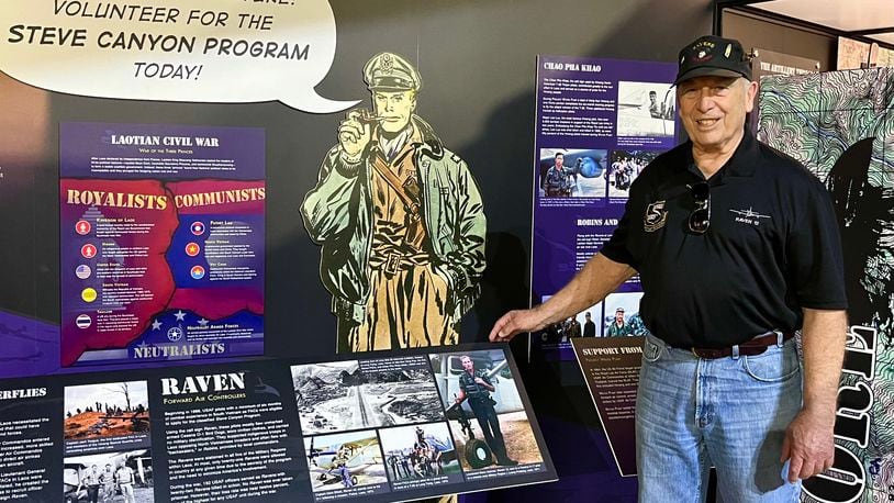 Air Force veteran and Raven Gene Hamner visits the Ravens exhibit at the National Museum of the U.S. Air Force on the day of its opening. A photo of the young Gene Hamner during his service is on the far right of the display. CONTRIBUTED