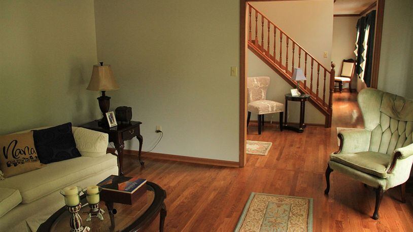 Glistening oak hardwood flooring was installed in the entry, the living room and the formal dining room.