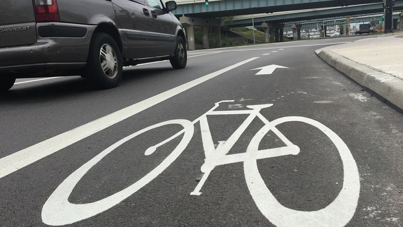 The bike lane at Warren Street, headed north, ends right before the U.S. 35 overpass. Next year, the city plans to extend the path up to Jefferson Street, to connect with an existing lane. CORNELIUS FROLIK / STAFF