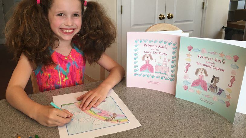 8-year-old Katie Pryor, who has published two books, works on a drawing for her third in her “Princess Katie” series. Katie attends third grade at Bellbrook’s Bell Creek Elementary School. CONTRIBUTED