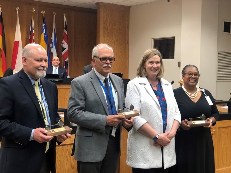 Dayton Mayor Nan Whaley passes out Keys to the City to Health Commissioner Jeff Cooper, Medical Director Michael Dohn and Director of Health Promotion Terra Williams with Public Health -- Dayton & Montgomery County. CORNELIUS FROLIK / STAFF