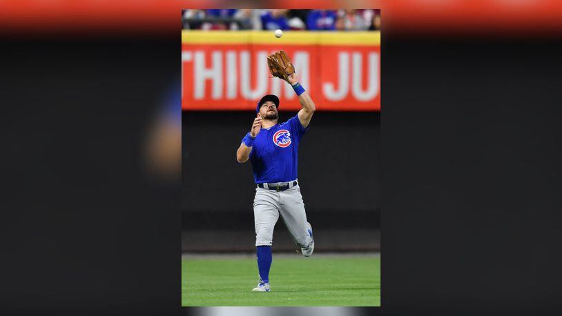 CINCINNATI, OH - MAY 14: Kyle Schwarber #12 of the Chicago Cubs catches a fly ball for an out in the ninth inning against the Cincinnati Reds at Great American Ball Park on May 14, 2019 in Cincinnati, Ohio. Chicago defeated Cincinnati 3-1. (Photo by Jamie Sabau/Getty Images)