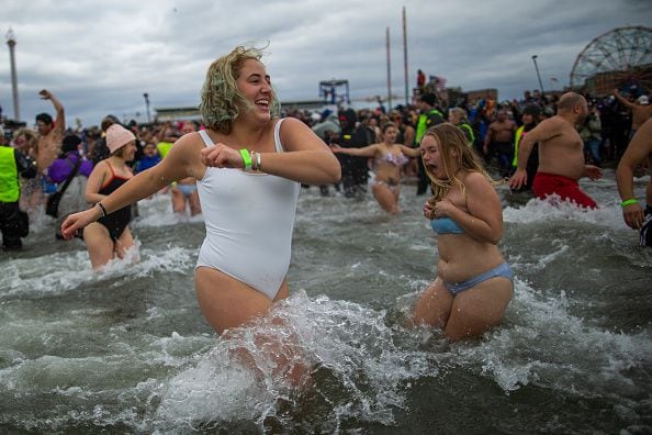 Photos: Thousands kick off the new year with a splash