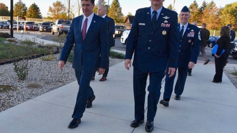 Secretary of Defense Mark T. Esper, left, walks with Gen. Arnold Bunch, right, Air Force Materiel Commander, during a visit to Wright-Patterson Air Force Base on Oct. 4, 2019. Esper’s visit marked the first time he had been to Wright-Patt during his time as defense secretary.