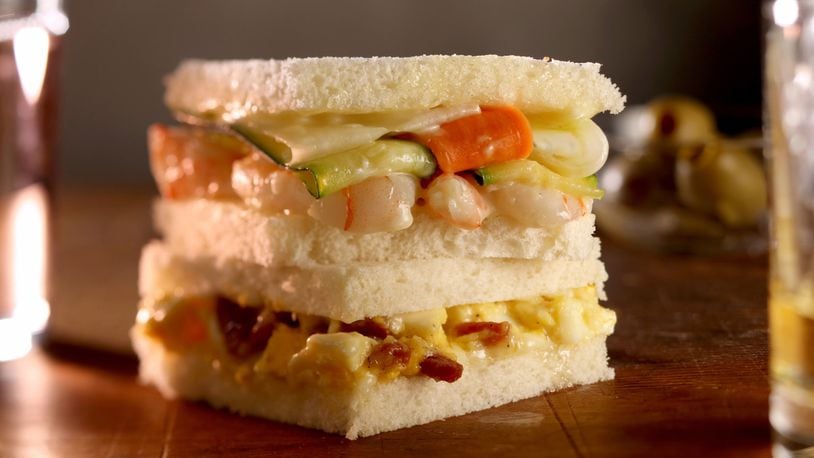 Shrimp and vegetable tramezzino, top, and carbonara tramezzino, are two of myriad types of the Italian sandwich. (Food styling by Lisa Schumacher) (Michael Tercha/Chicago Tribune/TNS)