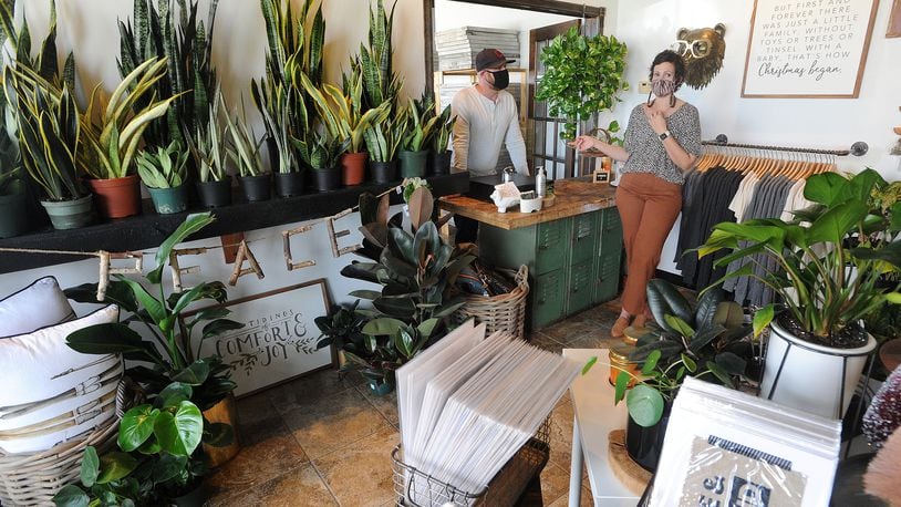 Ryan and Courtney Hart talk about their newly opened plant and home shop, Ivy Count in Clayton. It is the couples second location. MARSHALL GORBY\STAFF
