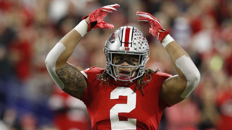 INDIANAPOLIS, INDIANA - DECEMBER 01: J.K. Dobbins #2 of the Ohio State Buckeyes celebrates after a play against the Northwestern Wildcats at Lucas Oil Stadium on December 01, 2018 in Indianapolis, Indiana. (Photo by Joe Robbins/Getty Images)
