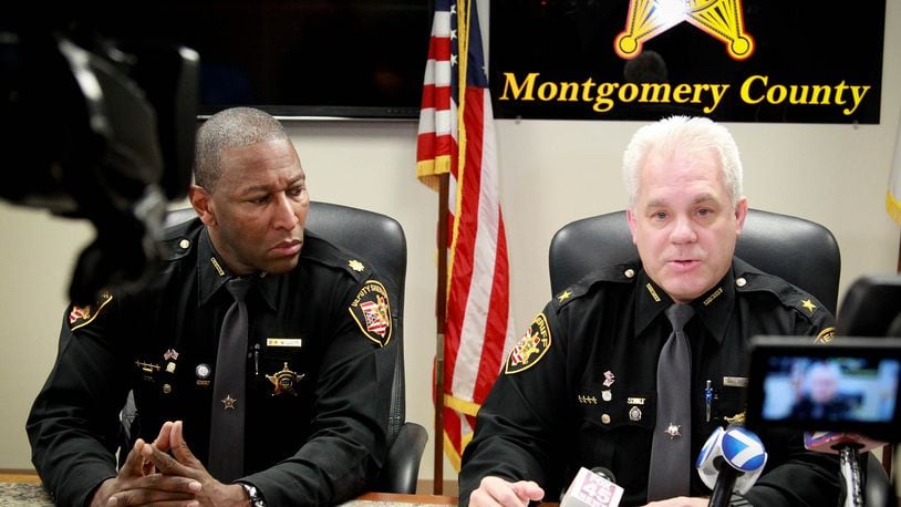 Two Montgomery County Sheriff’s deputies accused of sending racial text messages were terminated in February 2015. Sheriff Phil Plummer, right, and Major Daryl Wilson discussed the investigation during a press conference. JIM WITMER / STAFF