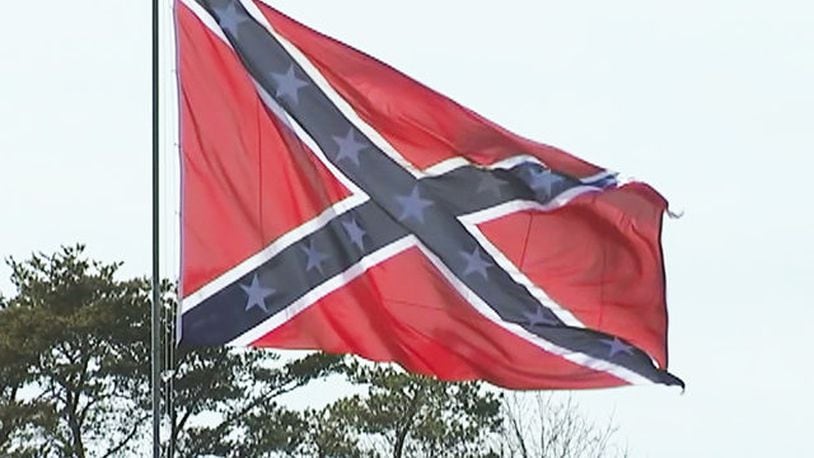 Members of the Sons of Confederate Veterans in a North Carolina county are flying a Confederate flag to protest the removal of  Civil War memorials.