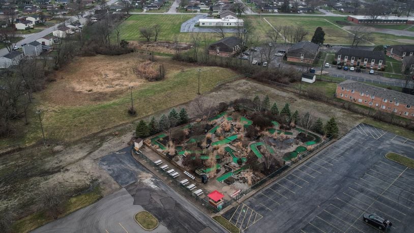 The Englewood Fun Center on South Main in Englewood wants to build a go kart track along the back side of their mini-golf area. This aerial shows the mini-golf, in the center, surrounded by vacant land, apartments and houses. JIM NOELKER/STAFF