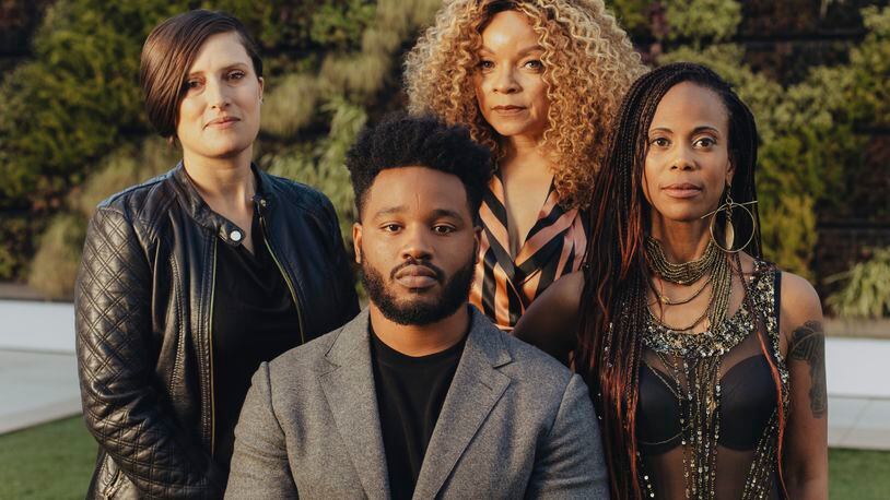 Ryan Coogler with some of his "Black Panther" department heads: from left, the cinematographer Rachel Morrison, the costume designer Ruth E. Carter, and the production designer Hannah Beachler, in Beverly Hills, Calif., Nov. 3, 2018. The crew of Black Panther is unusual among blockbusters for its large number of female department heads. (Rozette Rago/The New York Times)