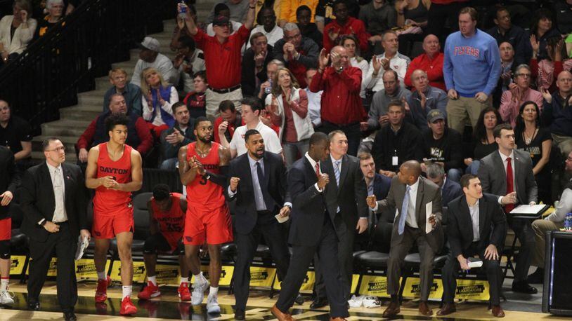 The Dayton bench reacts to a score during a game against Virginia Commonwealth on Wednesday, Jan. 19, 2019, at the Siegel Center in Richmond, Va. David Jablonski/Staff