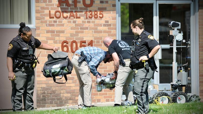 The Dayton bomb squad, and the Montgomery County Sheriff’s Department investigated what appears to be a suspicious, backpack at 6054 North Dixie Dr. in Harrison Township Wednesday, May 10, 2023. The road with shirt down for a short period of time. MARSHALL GORBY \STAFF