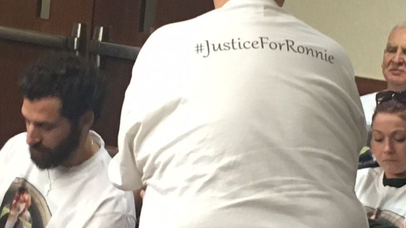 A courtroom attendee shows his support Monday for Ronnie Bowers, who died after being shot in Kettering Sept. 4 shortly after leaving AlterFest. NICK BLIZZARD/STAFF