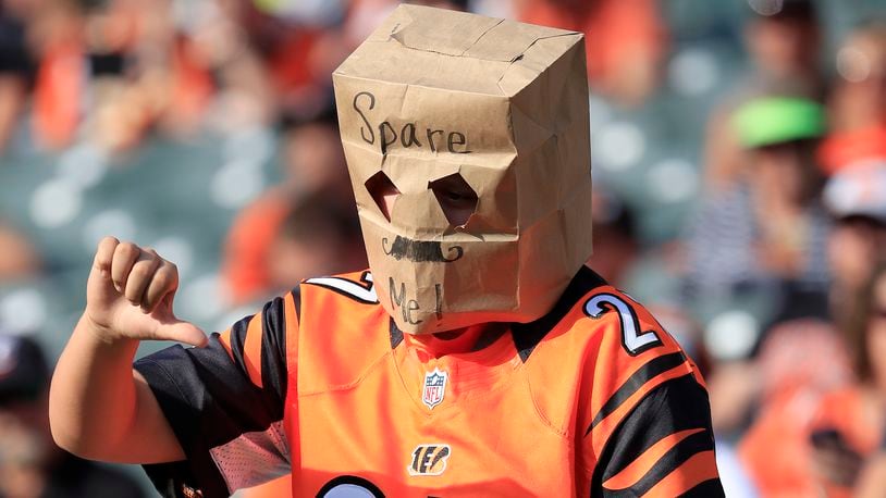 CINCINNATI, OHIO - OCTOBER 20:   A Cincinnati Bengals fan wears a bag on his head during the game against the Jacksonville Jaguars at Paul Brown Stadium on October 20, 2019 in Cincinnati, Ohio. The Bengals loss 27-17 to fall to 0-7 for the season. (Photo by Andy Lyons/Getty Images)