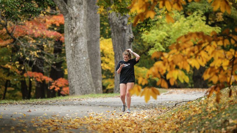 A warm weekend and week may bring our first frost of the season this coming weekend. The University of Dayton student Abby Medler runs through Woodland Cemetery Monday October 12.