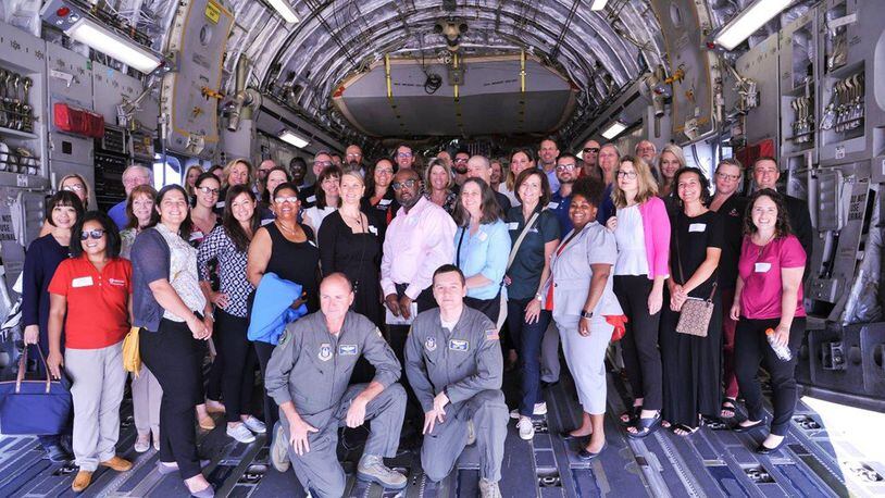 Guests from the Miami Valley Higher Education Consortium took a look inside one of the 445th Airlift Wing’s C-17 at Wright-Patterson Air Force Base. The plane visit was part of an all-day tour that took place Aug. 6. (U.S. Air Force photo/Pamela Piccoli)