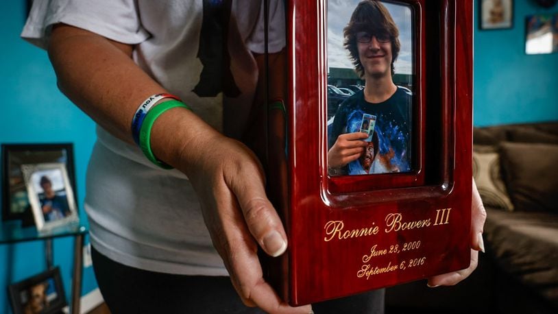 Jessica Combs keeps Ronnie Bowers ashes on a kitchen shelf. Combs started a scholarship in honor of her son who was shot in 2016 while fleeing a confrontation in which he was not involved. JIM NOELKER/STAFF
