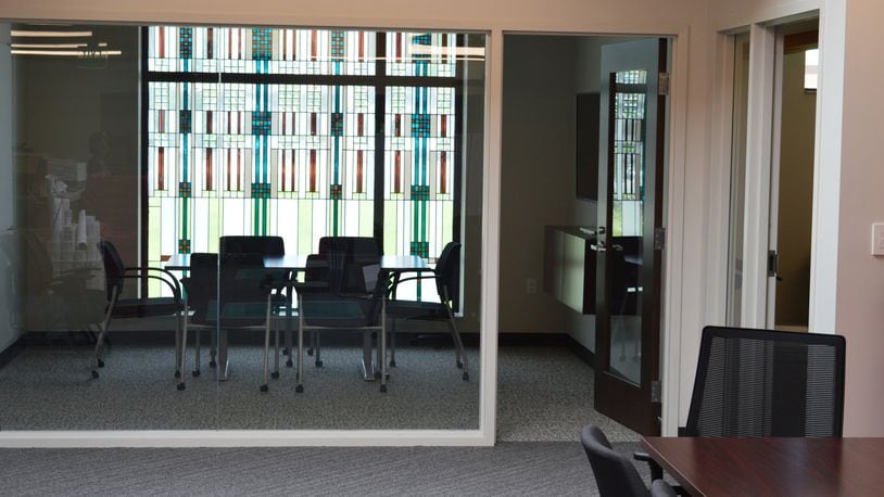 Several conference rooms throughout the new municipal building provide well-lit comfortable settings but this one adds some color, as well, utilizing a window left from when the building was the Lane Public Library. CONTRIBUTED/BOB RATTERMAN