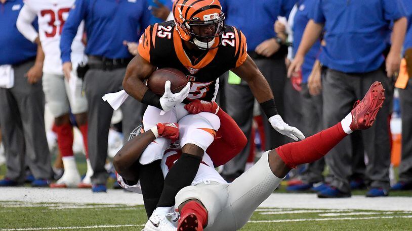 CINCINNATI, OH - AUGUST 22: Giovani Bernard #25 of the Cincinnati Bengals is tackled after catching a pass during the first quarter of the preseason game against the New York Giants at Paul Brown Stadium on August 22, 2019 in Cincinnati, Ohio. (Photo by Bobby Ellis/Getty Images)
