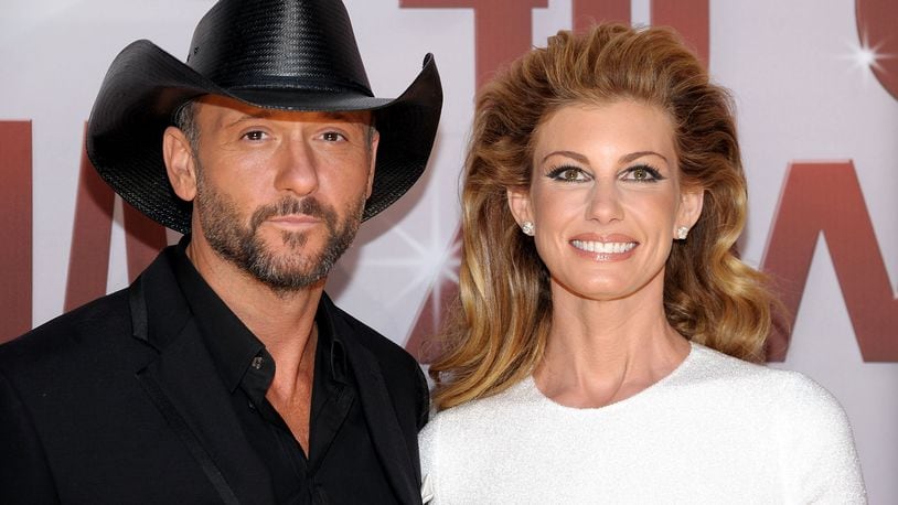 NASHVILLE, TN - NOVEMBER 09: Tim McGraw and Faith Hill attend the 45th annual CMA Awards at the Bridgestone Arena on November 9, 2011 in Nashville, Tennessee. (Photo by Michael Loccisano/Getty Images)