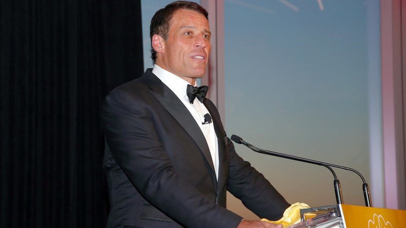 FILE PHOTO: Lifetime Achievement Award Honoree Tony Robbins speaks onstage at the 2017 Graduation Gala to benefit Happy Hearts Fund held at Aspire at One World Trade Center Observatory on June 7, 2017 in New York City.  (Photo by Paul Zimmerman/Getty Images for  Happy Hearts Fund)