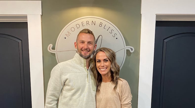 Tyler and Lindsi Stupp pose for a photo inside Modern Bliss Salon & Spa at 45 S. Main St. in downtown Miamisburg Saturday Nov. 14, 2020. Lindsi Stupp started the business this month after 15 years as a hair stylist. CONTRIBUTED